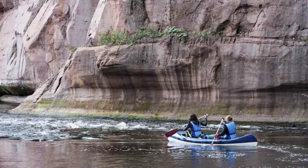 Karlamuiza Canoeing in Gauja National Park cliff