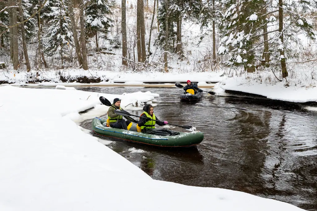 movement spontaneous winter packrafting latvia snow ice adventure
